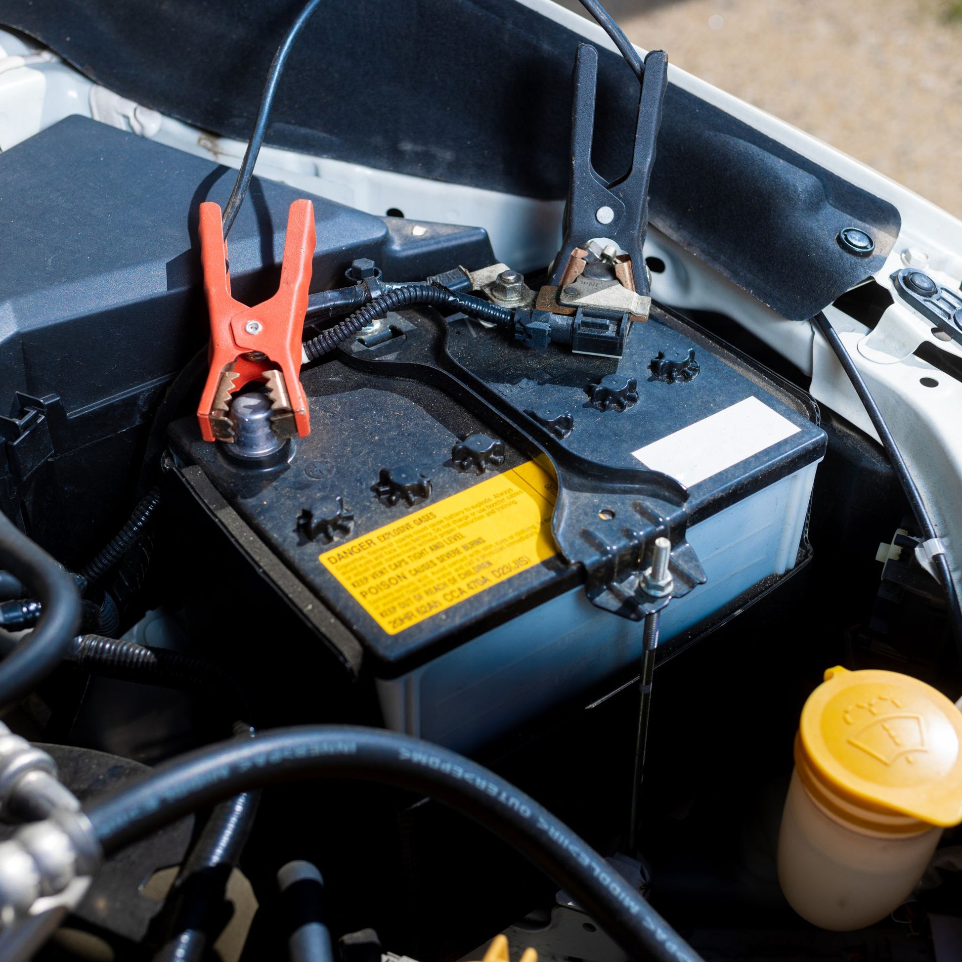 Battery Boost Service: assisting a customer who's car battery is dead.