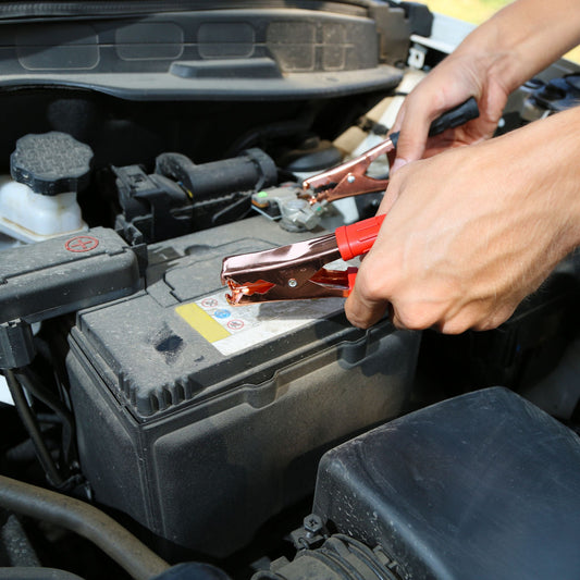 Battery Boost Service Near Pickering, Ontario: assisting a customer who's car battery is dead.