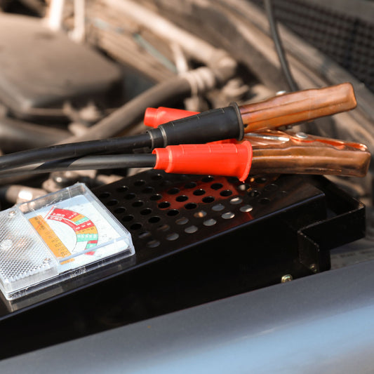 Battery Boost Service Near Whitby, Ontario: assisting a customer who's car battery is dead.